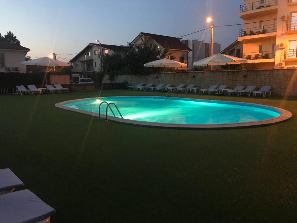 Bazén v ubytování Hotel Olguta nebo v jeho okolí