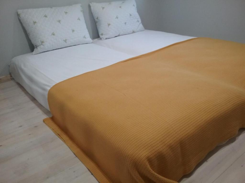 Postel nebo postele na pokoji v ubytování Perseus Studios