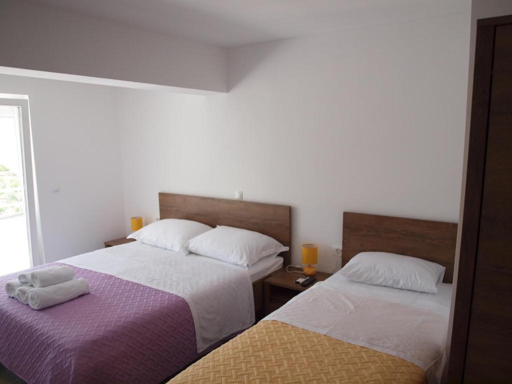 Posteľ alebo postele v izbe v ubytovaní Apartman&Studio S