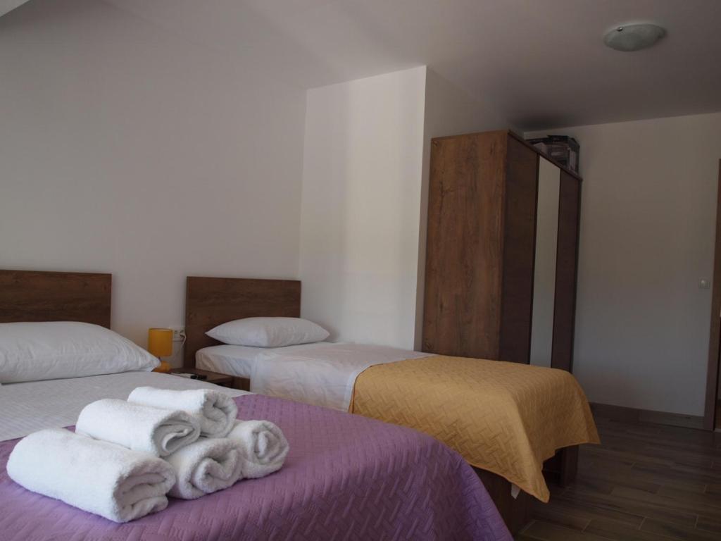 Posteľ alebo postele v izbe v ubytovaní Apartman&Studio S