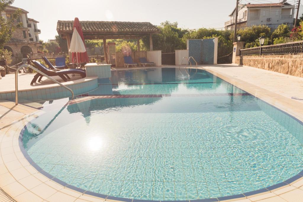 a pool with a pool table and a swimming pool at Kemerli Konak Boutique Hotel in Kyrenia