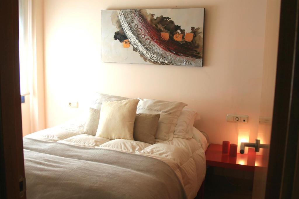 Posteľ alebo postele v izbe v ubytovaní APARTAMENTO MALAGA CENTRO Y PLAYA-PARKING