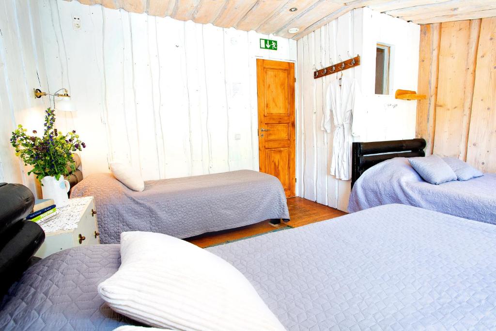 Postel nebo postele na pokoji v ubytování Mi Sann Holiday Home