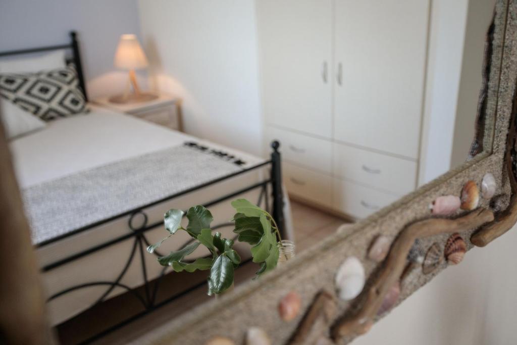 Postel nebo postele na pokoji v ubytování Salty Apartments Sea View Naxos