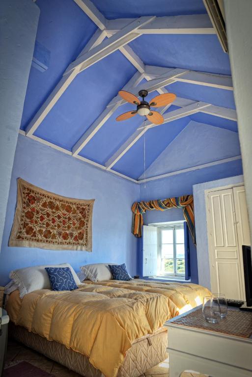 Postel nebo postele na pokoji v ubytování La Casa de Bovedas Charming Inn