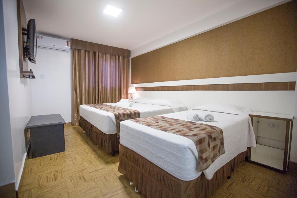 Postel nebo postele na pokoji v ubytování Hotel Vivere Cataratas