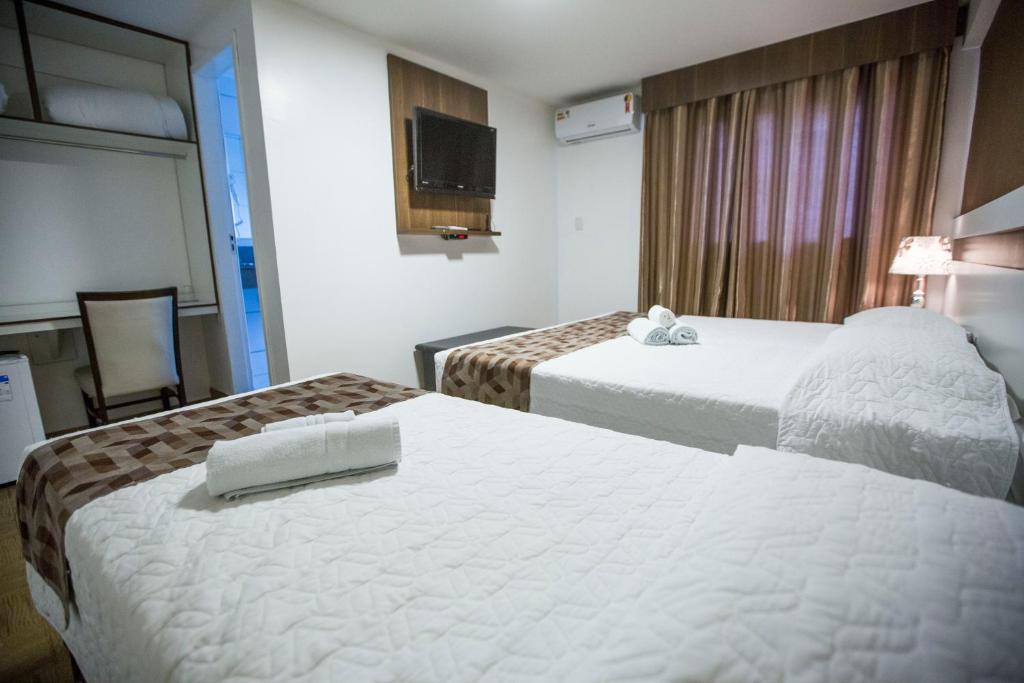 Postel nebo postele na pokoji v ubytování Hotel Vivere Cataratas