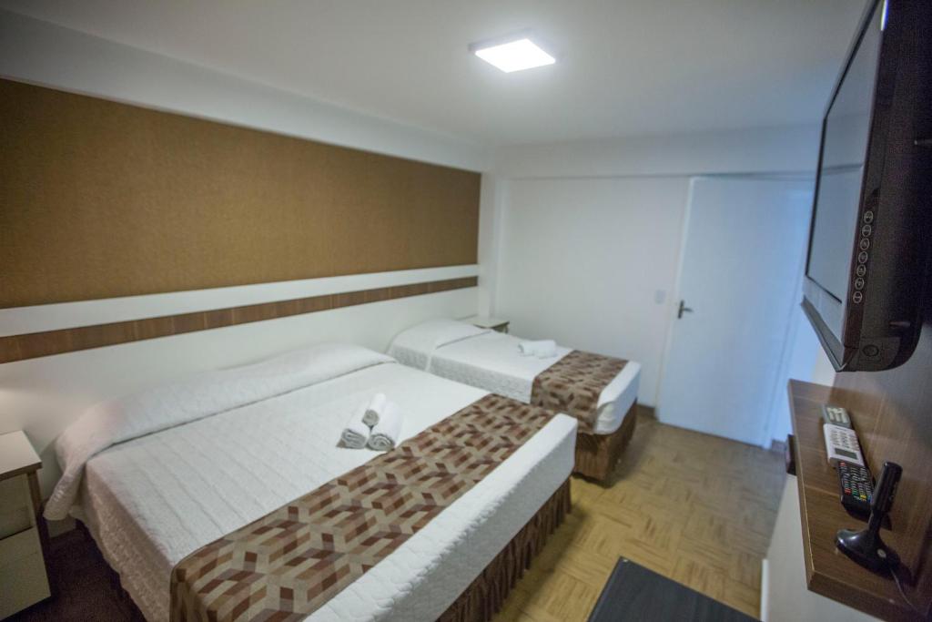 Postel nebo postele na pokoji v ubytování Hotel Vivere Cataratas
