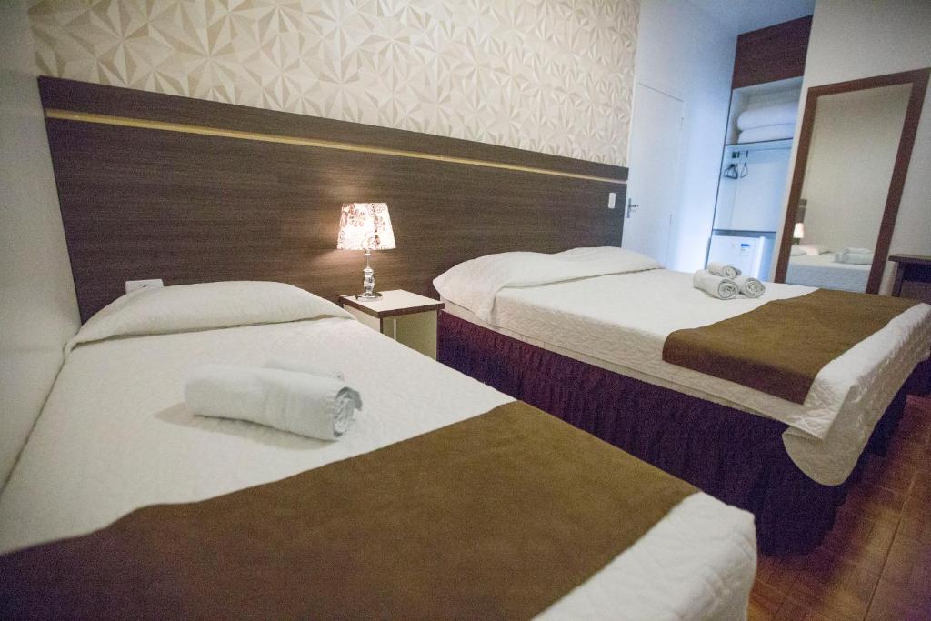 Postel nebo postele na pokoji v ubytování Hotel Vivere Cataratas