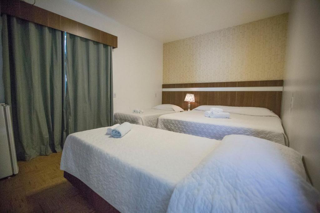Postel nebo postele na pokoji v ubytování Hotel Vivere Cataratas