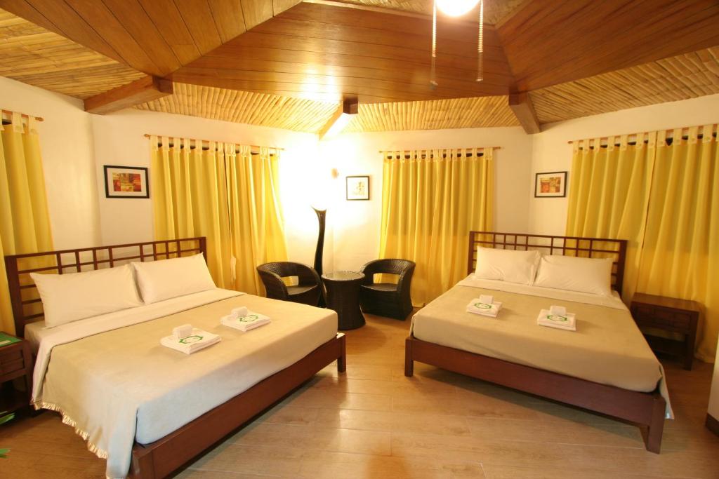Postel nebo postele na pokoji v ubytování Coron Hilltop View Resort