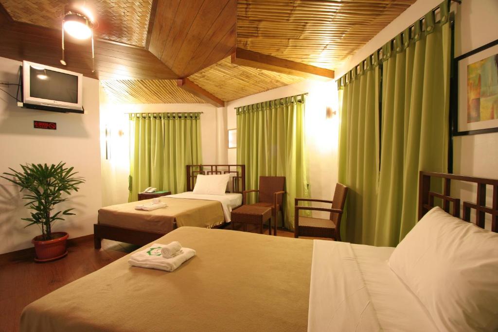 Postel nebo postele na pokoji v ubytování Coron Hilltop View Resort