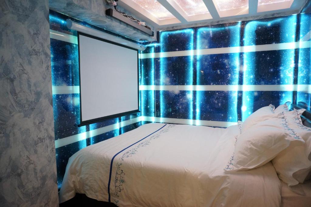 Postel nebo postele na pokoji v ubytování Star City Hotel