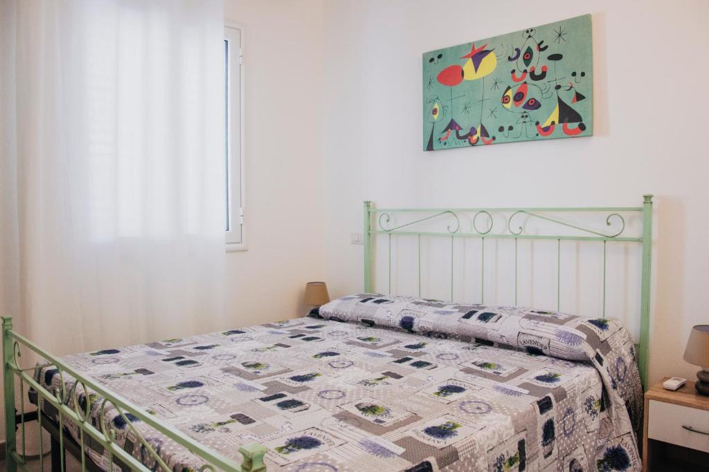 Postel nebo postele na pokoji v ubytování Milva's Apartment