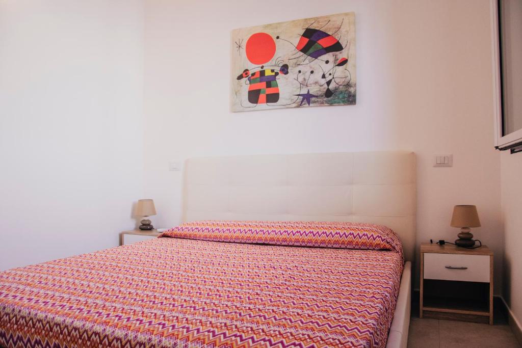 Postel nebo postele na pokoji v ubytování Milva's Apartment