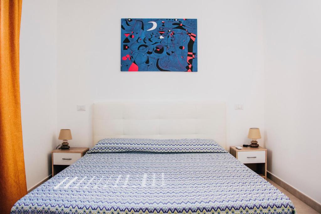 Postel nebo postele na pokoji v ubytování Milva's Apartment