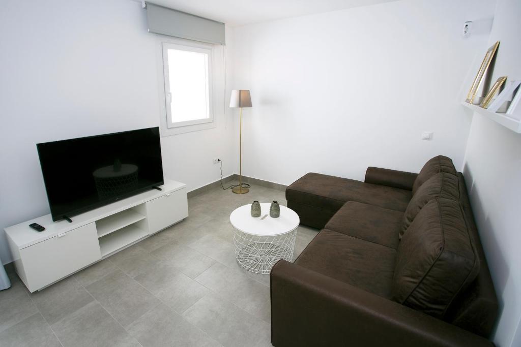 Telewizja i/lub zestaw kina domowego w obiekcie MONKÓ - MANGO & TROPYCAL APARTMENT o