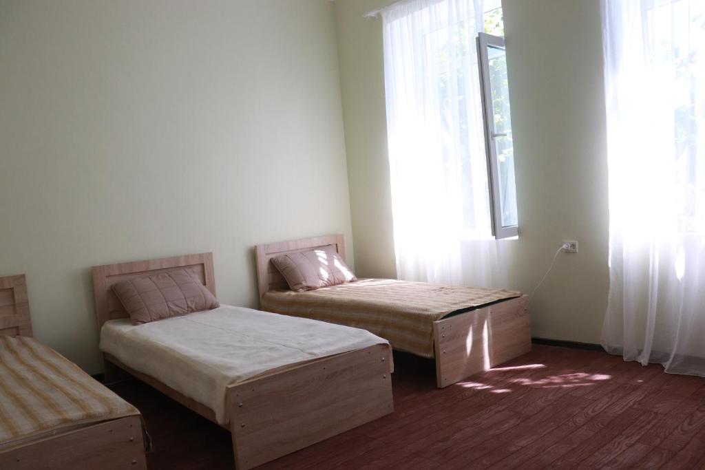 Postel nebo postele na pokoji v ubytování GreenGate