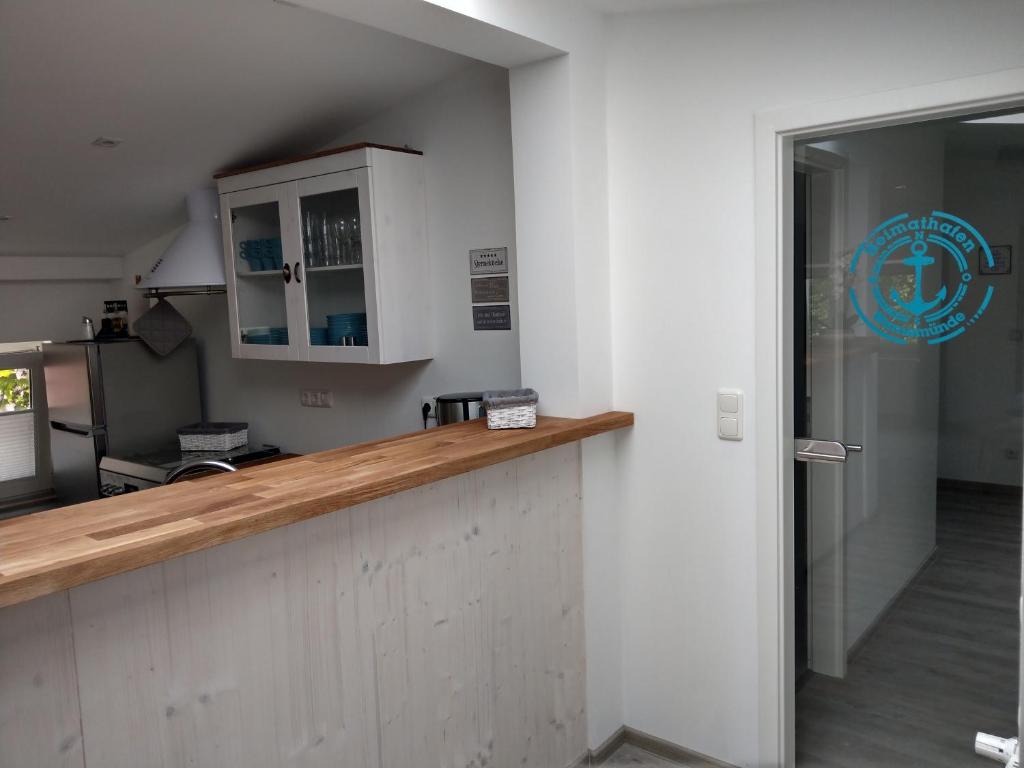 Kuchyň nebo kuchyňský kout v ubytování Gästehaus Twee Linden