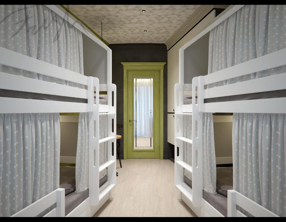 Postel nebo postele na pokoji v ubytování Central Hostel