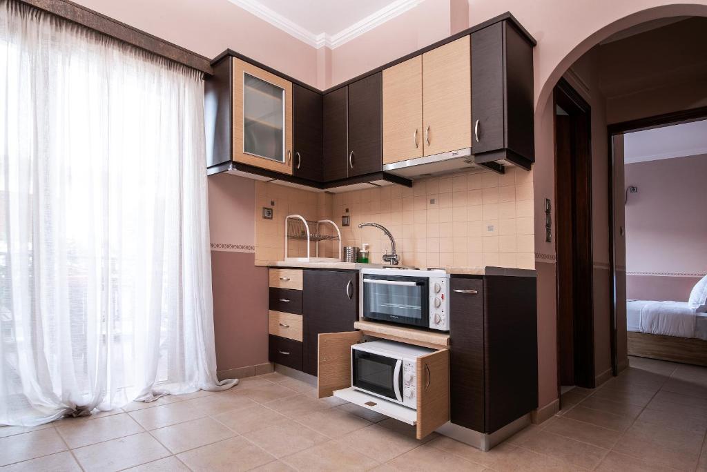 Kuchyň nebo kuchyňský kout v ubytování Cyrenia Guesthouse
