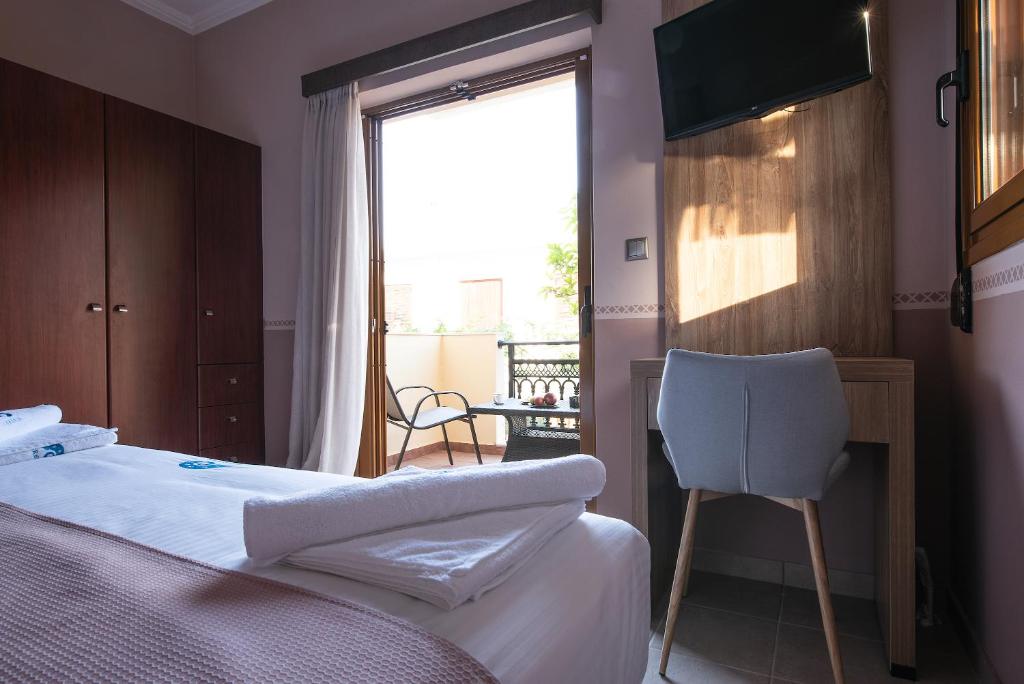 Postel nebo postele na pokoji v ubytování Cyrenia Guesthouse