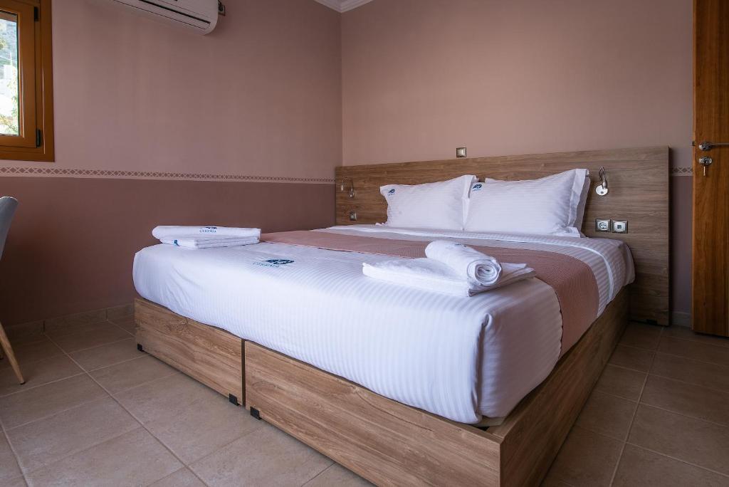 Postel nebo postele na pokoji v ubytování Cyrenia Guesthouse