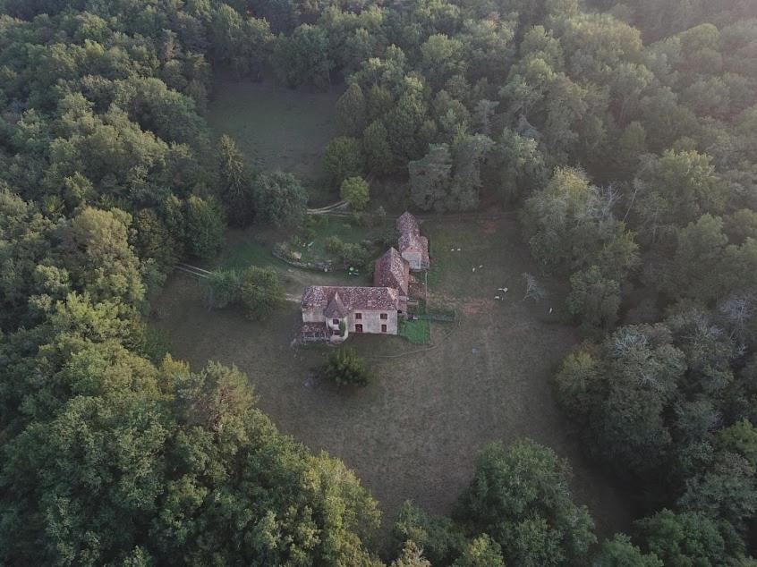 an aerial view of a house in the middle of a forest at Touvent maison au milieu des bois in Savignac-de-Miremont