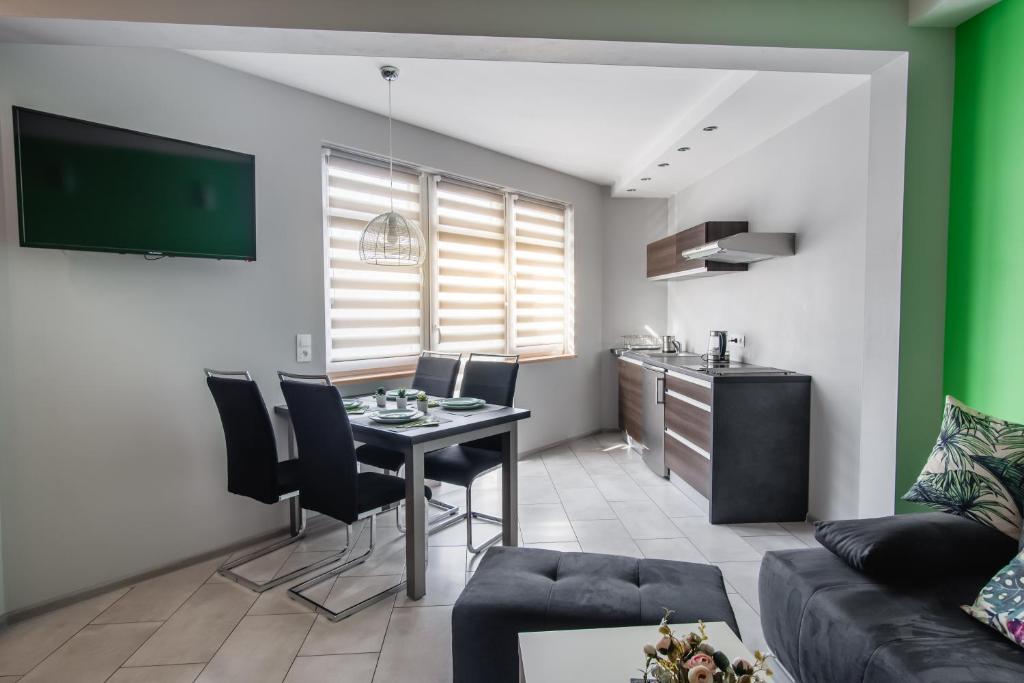Kuchyňa alebo kuchynka v ubytovaní Apartamenty TRZY KOLORY