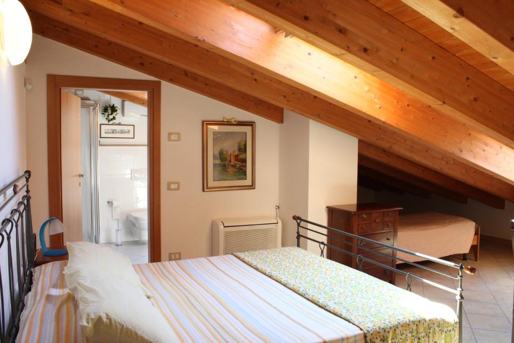 Postel nebo postele na pokoji v ubytování Bed & Breakfast Lucy