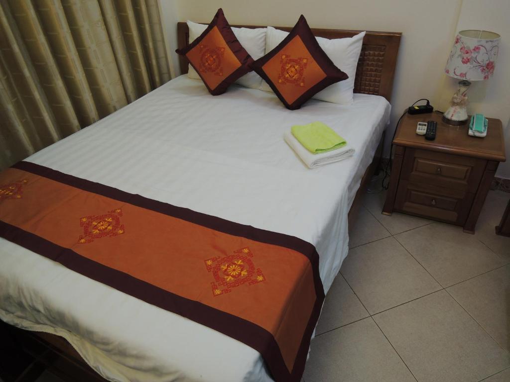 Postel nebo postele na pokoji v ubytování Hanoi Ecogreen Hostel