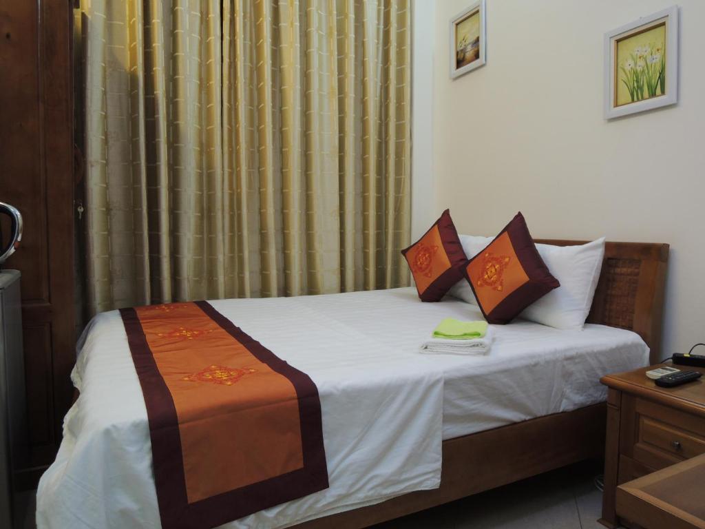 Postel nebo postele na pokoji v ubytování Hanoi Ecogreen Hostel