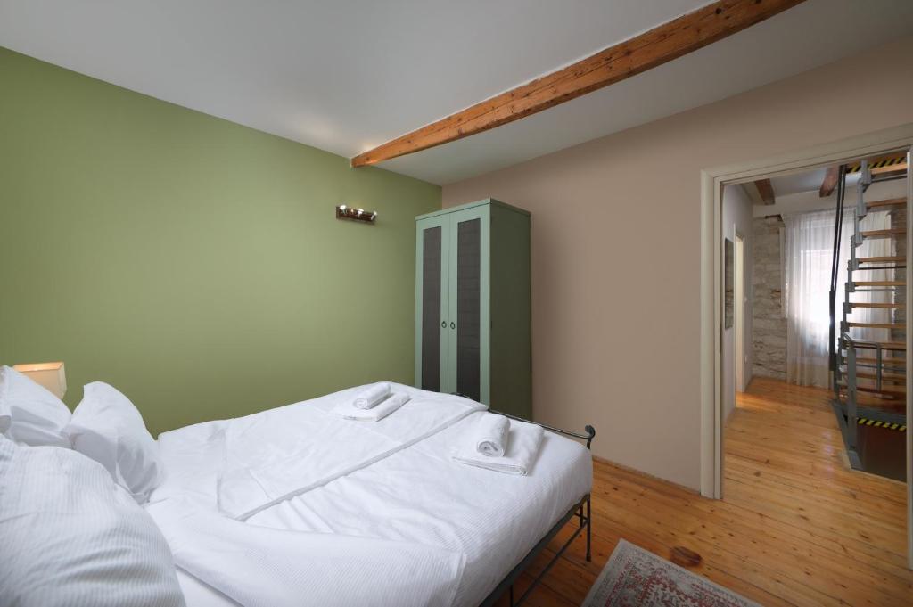 Postel nebo postele na pokoji v ubytování Angelo d'Oro Holiday Home Silva