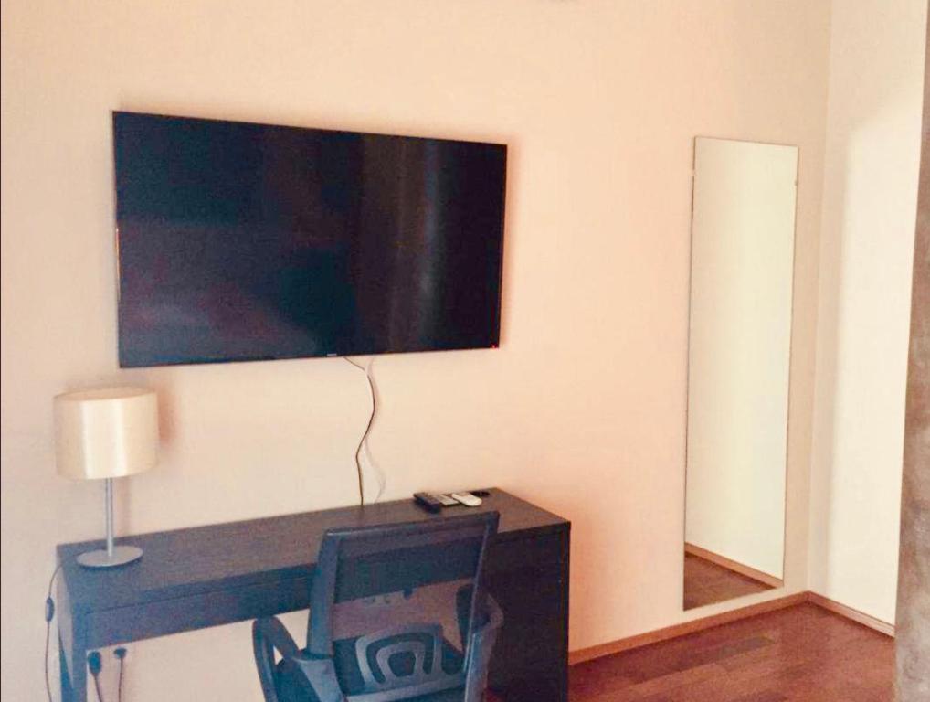 TV a/nebo společenská místnost v ubytování Atrium Panzio