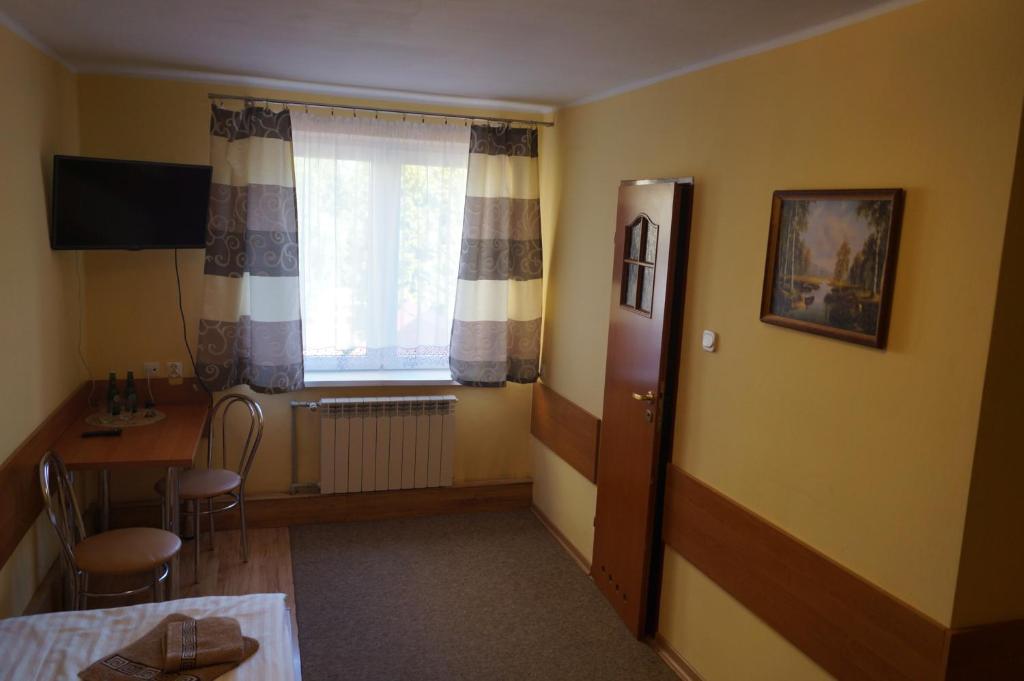Telewizja i/lub zestaw kina domowego w obiekcie Hotel-Restauracja-Bar Rudka