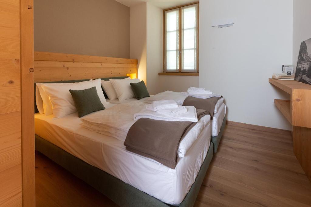 Postel nebo postele na pokoji v ubytování HOTEL AD Residence