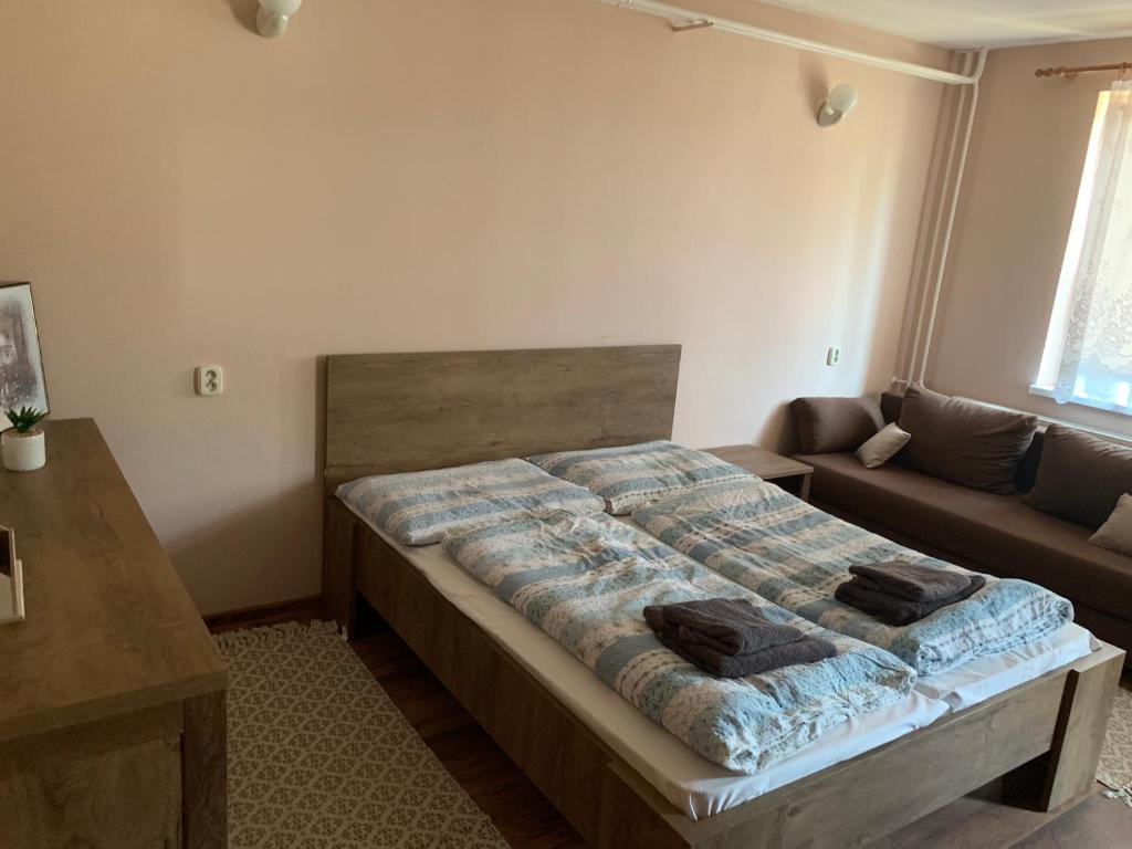 Postel nebo postele na pokoji v ubytování Apartmánový dom Magda