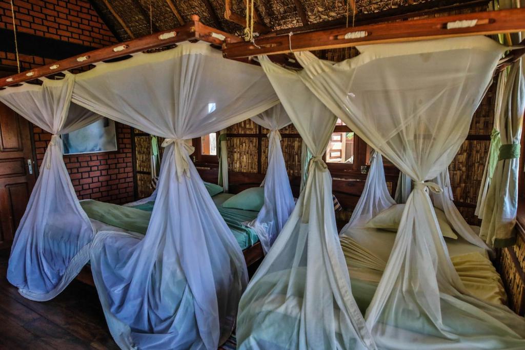 Un ou plusieurs lits dans un hébergement de l'établissement RELAIS DU KIRINDY