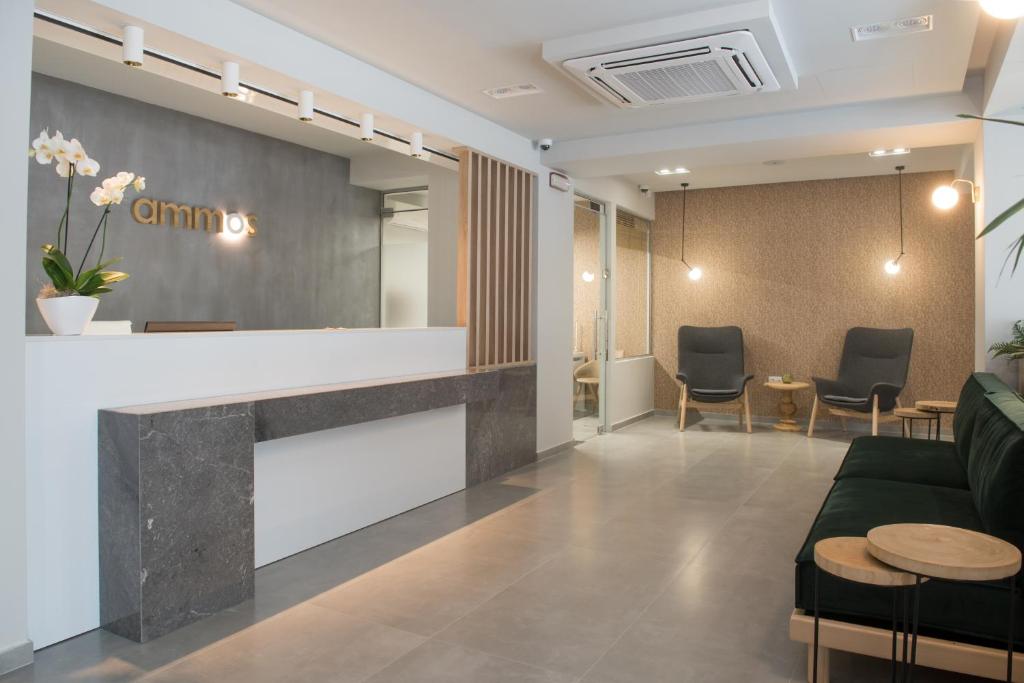 a lobby of a clinic with a waiting room at Ammos Beach Seaside Luxury Suites Hotel in Olympiaki Akti