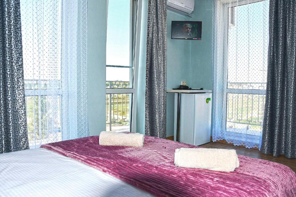 Postel nebo postele na pokoji v ubytování Hotel Golden Beach