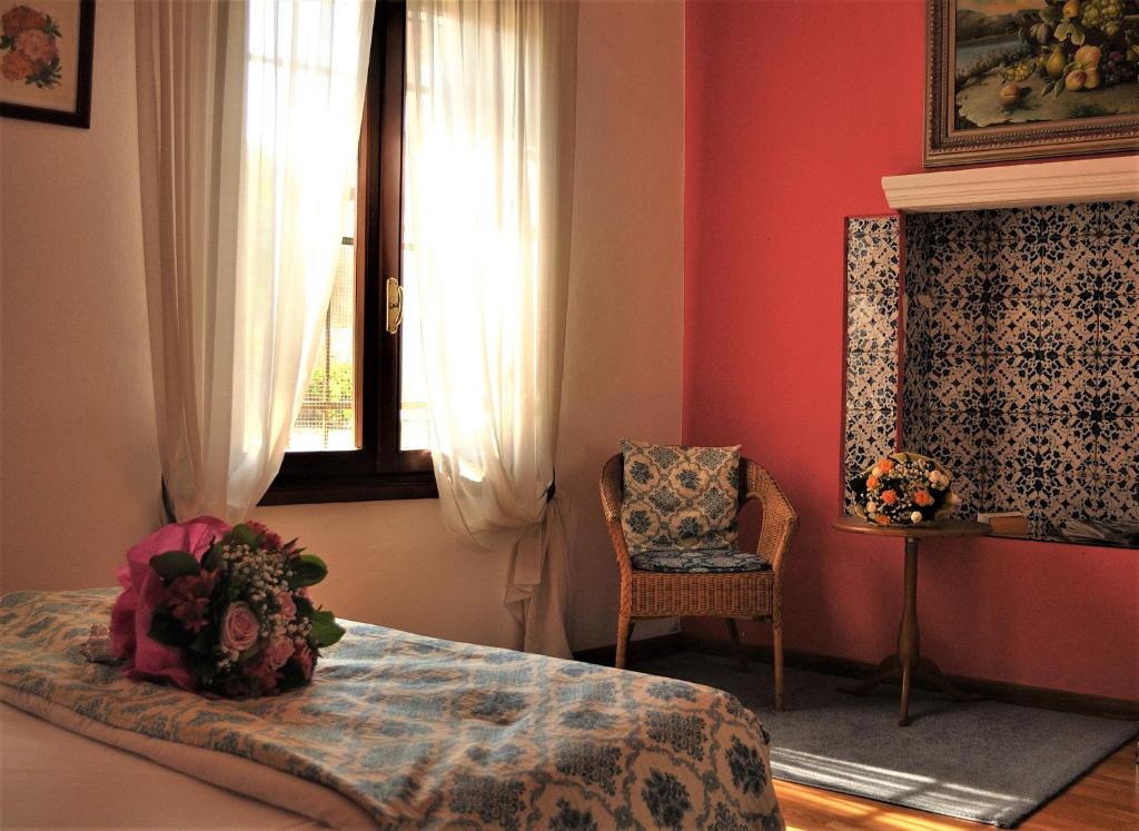 Postel nebo postele na pokoji v ubytování Relais Alcova del Doge
