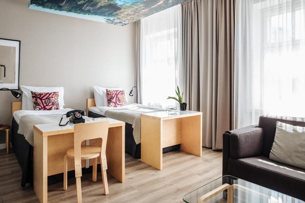 Postel nebo postele na pokoji v ubytování Hotel Helka
