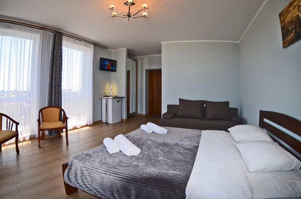 Postel nebo postele na pokoji v ubytování Hotel Golden Beach
