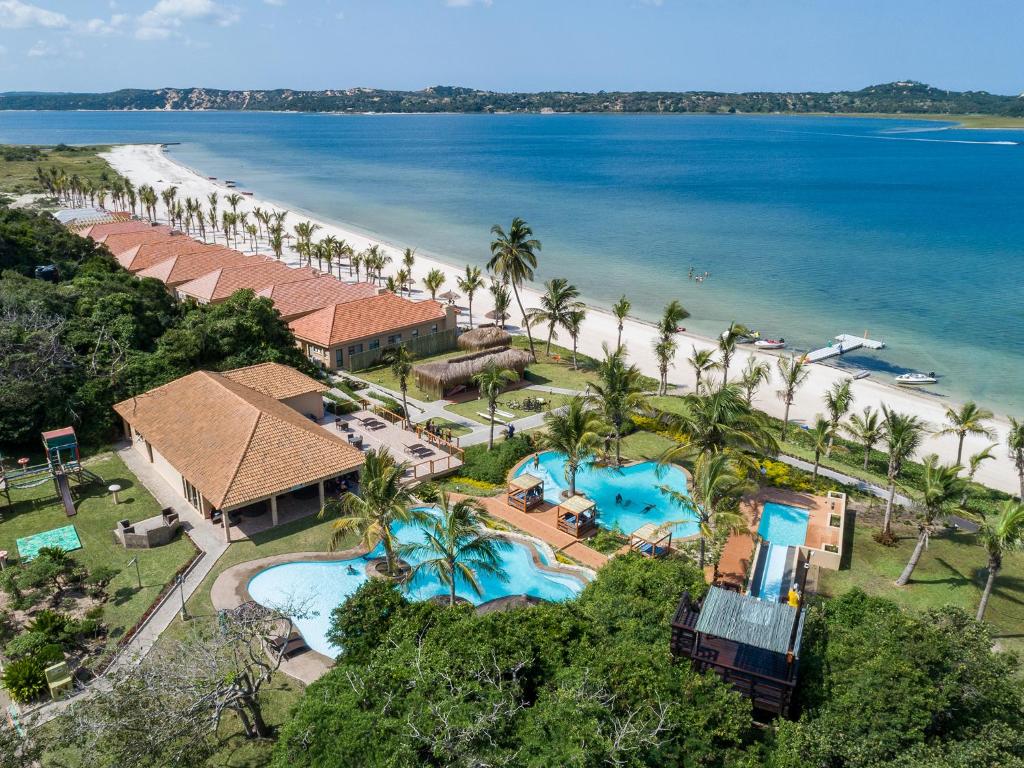 an aerial view of the resort and the beach at San Martinho Beach Club in Vila Praia Do Bilene