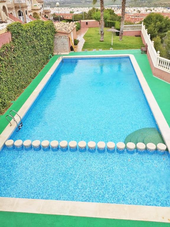 Zdjęcie z galerii obiektu Bungalow con terraza, piscina y vistas al mar w mieście Gran Alacant