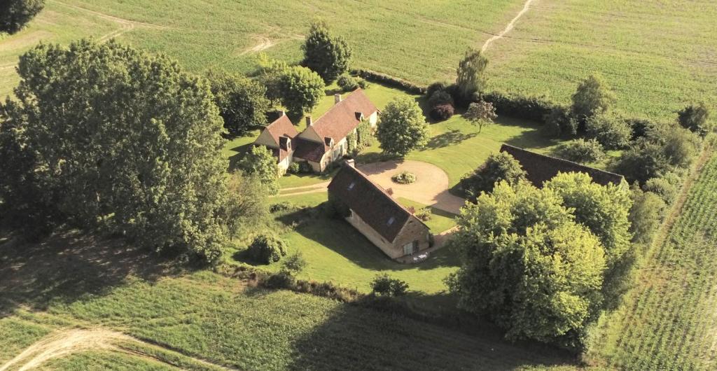an aerial view of a large house in a field at Le Pautonier in Saint-Aubin-des-Grois