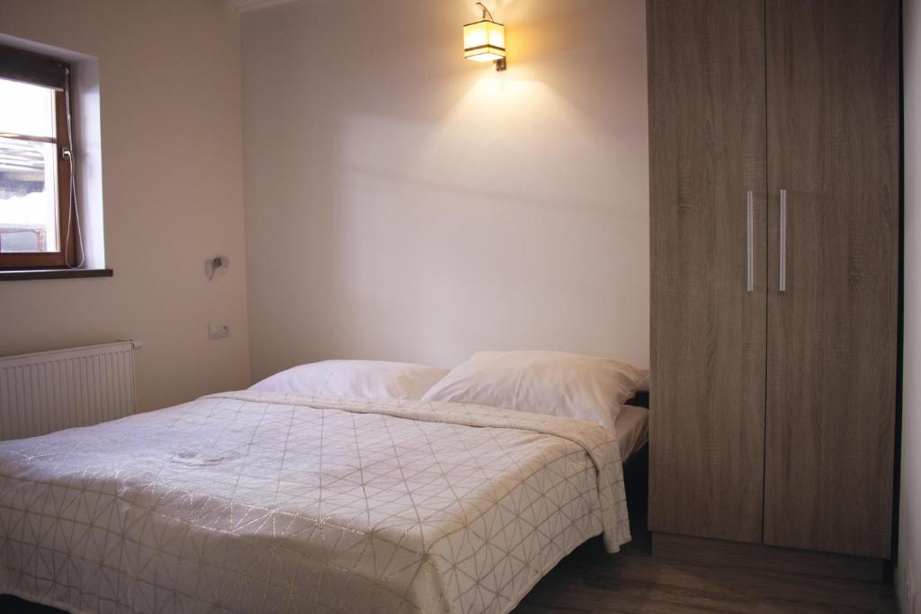 Postel nebo postele na pokoji v ubytování Chata Diana