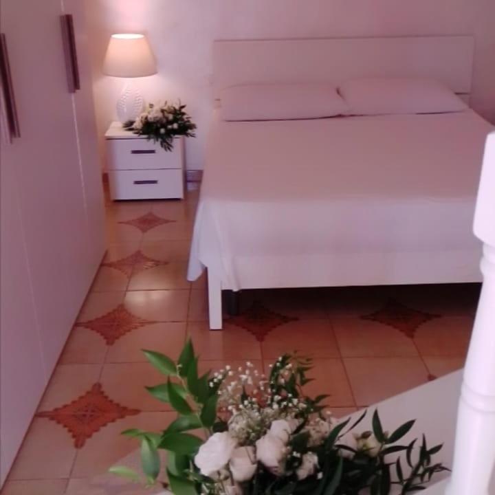 Postel nebo postele na pokoji v ubytování B&B La Felicità