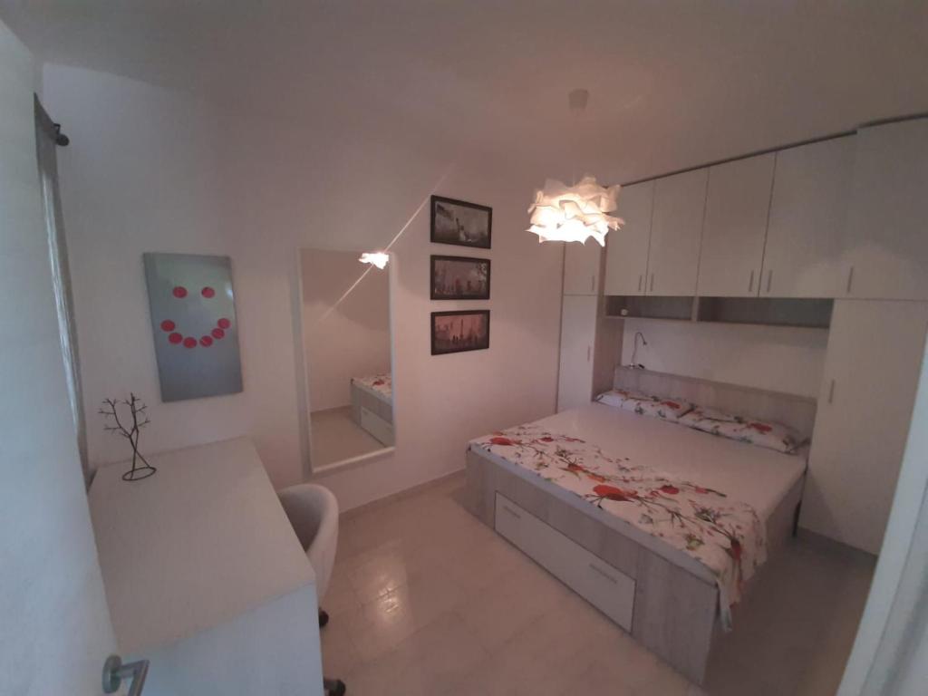 Postel nebo postele na pokoji v ubytování Apartment Mia