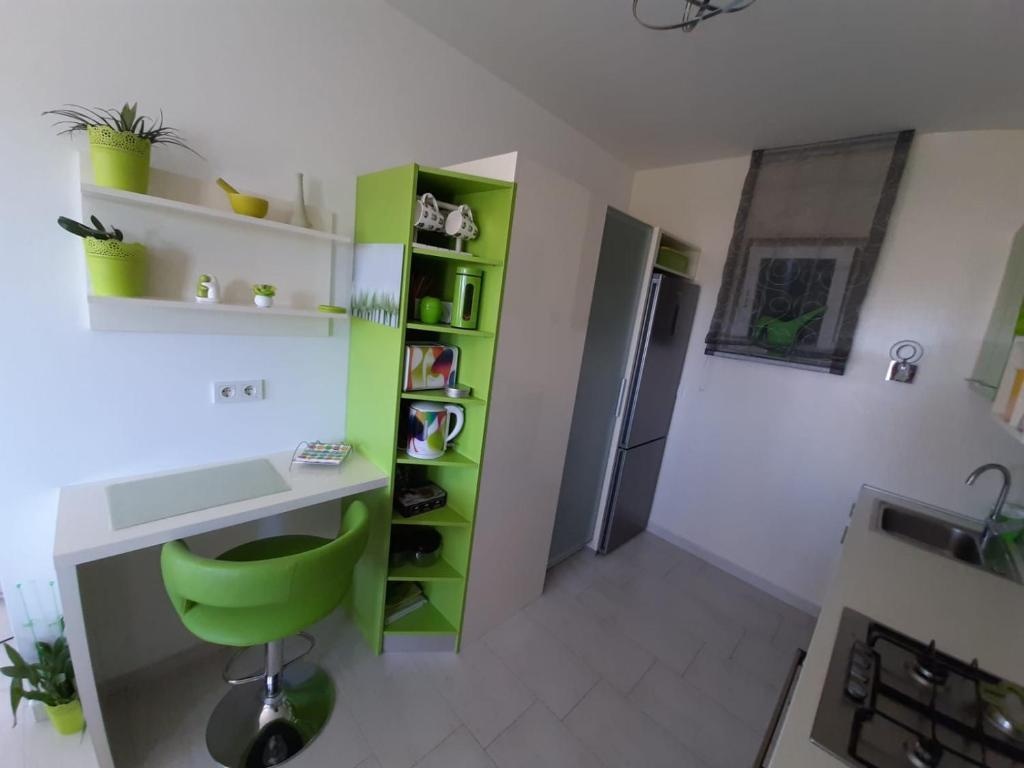 Kuchyň nebo kuchyňský kout v ubytování Apartment Mia